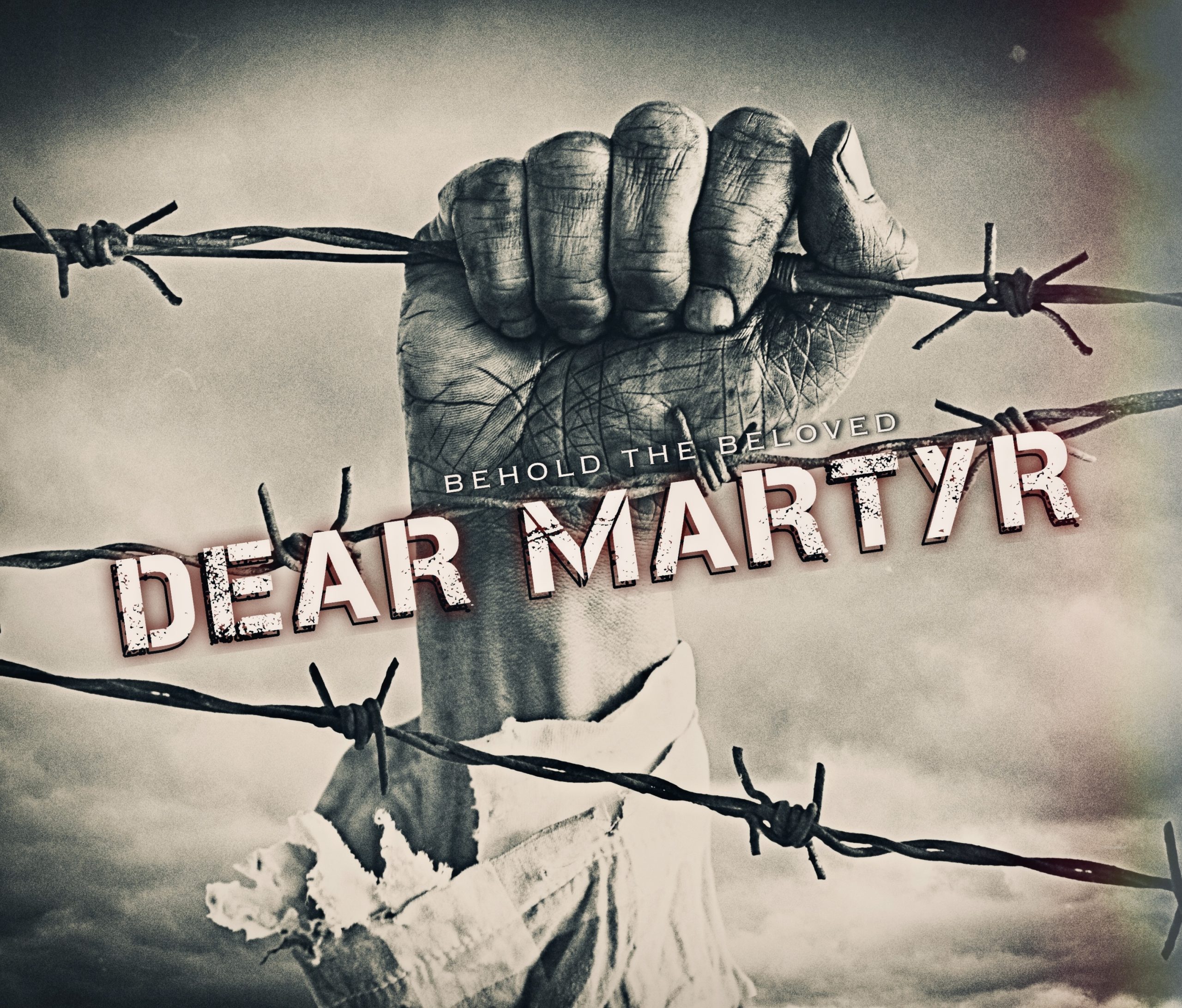 Hand of refugee holding barbed wire